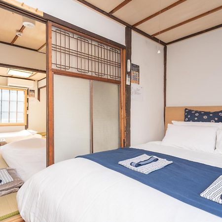 Guesthouse Oneworld Shijo四条京町屋 Kyoto Exterior photo