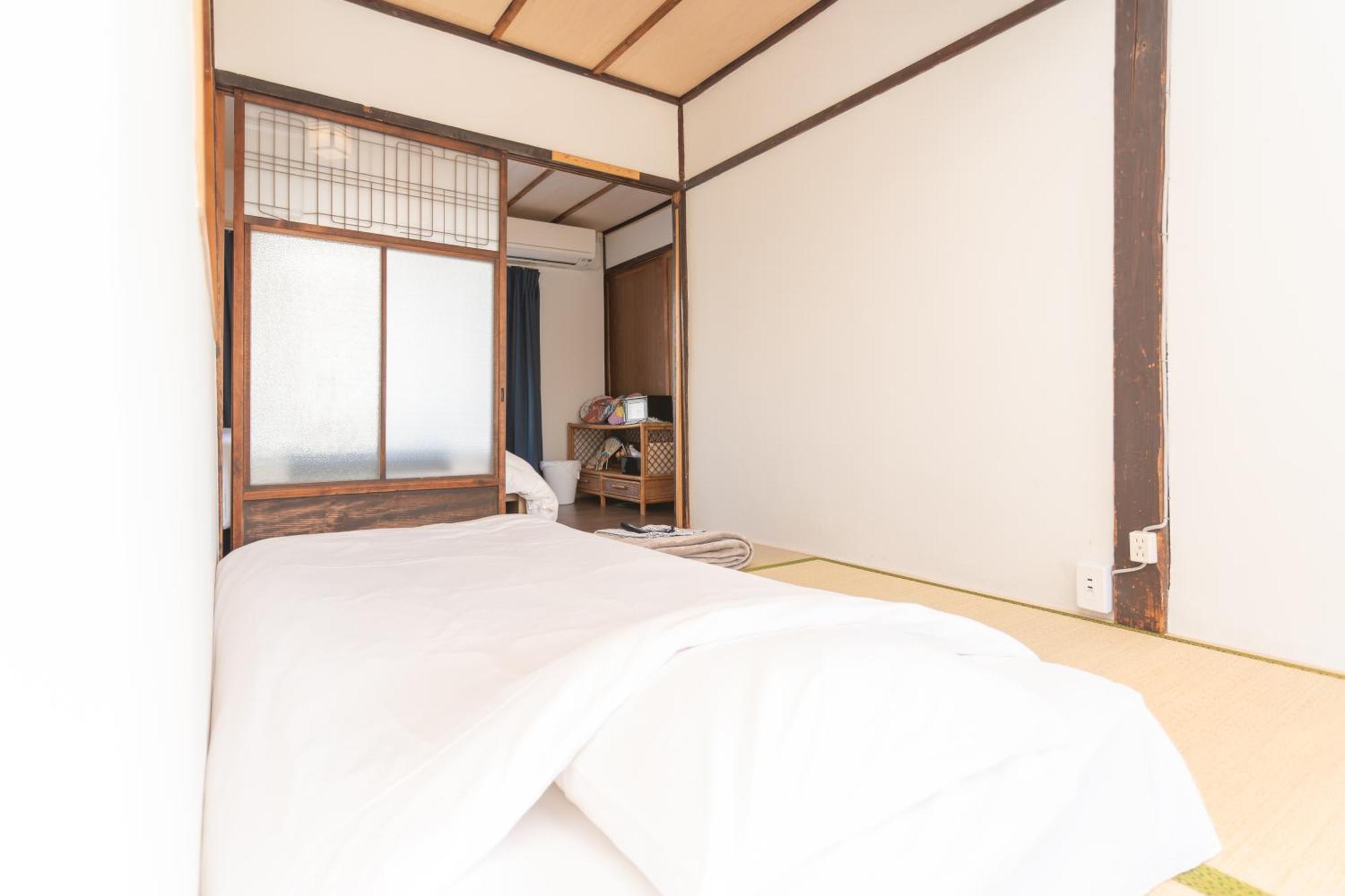 Guesthouse Oneworld Shijo四条京町屋 Kyoto Exterior photo
